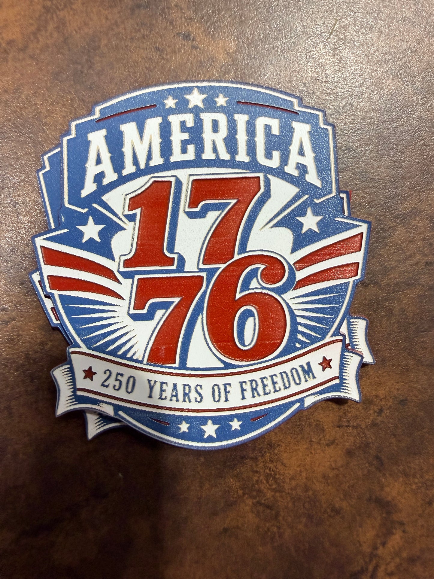The America 1776 Acrylic Patch by DB Custom Creations features bold "America 1776" text, red, white, and blue stars and stripes, and a "250 Years of Freedom" banner on a textured brown background.