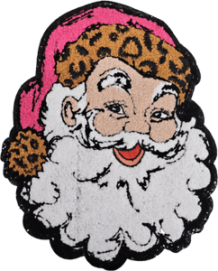 The Christmas Santa Patch (7) by DB Custom Creations features a cartoon-style Santa with a white beard, red lips, rosy cheeks, and pink hat with leopard print trim—perfect for heat press or iron-on to make fun, personalized clothing.