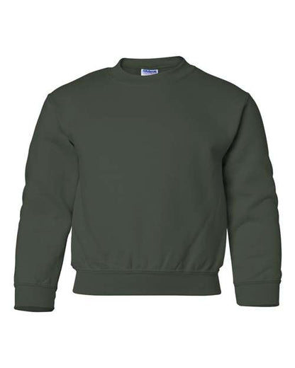 The Gildan 18000B is a plain dark green crewneck sweatshirt with long sleeves, ribbed cuffs and hem, made from Heavy Blend fabric and OEKO-TEX certified for safe, sustainable manufacturing, shown against a white background.