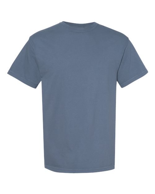 The Comfort Colors 1717 is a garment-dyed, slate blue crew neck t-shirt with short sleeves, made from sustainable cotton and shown against a white background.