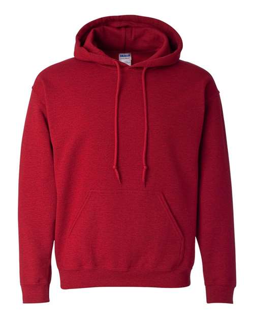 The Gildan 18500 Heavy Blend hoodie in plain red features a front pocket and drawstrings, shown on a white background. Made sustainably for comfort you can feel good about.