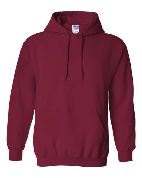 The Gildan 18500 hoodie is a plain maroon Heavy Blend pullover with a front pocket and drawstrings, made from OEKO-TEX certified materials for peace of mind, shown against a white background.
