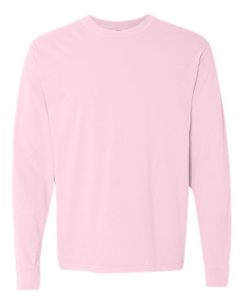 The Comfort Colors 6014 is a plain, light pink long-sleeve crew neck shirt made from soft ring spun cotton with no visible designs, logos, or patterns, displayed on a white background.