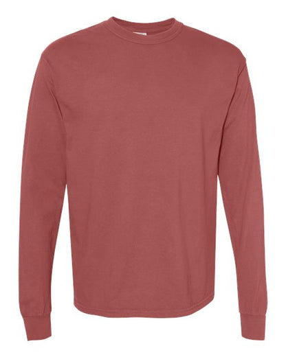 The Comfort Colors 6014 is a plain, long-sleeve t-shirt in muted reddish-brown, made from soft ring spun cotton with a crew neckline. It features no visible designs or logos and is displayed on a white background.