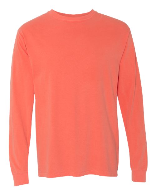 The Comfort Colors 6014 is a solid coral long-sleeve crew neck t-shirt made from soft ring spun cotton, shown on a white background.