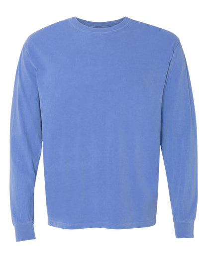 The Comfort Colors 6014 is a long-sleeve crew neck shirt in solid light blue, made from soft ring spun cotton and shown on a white background.