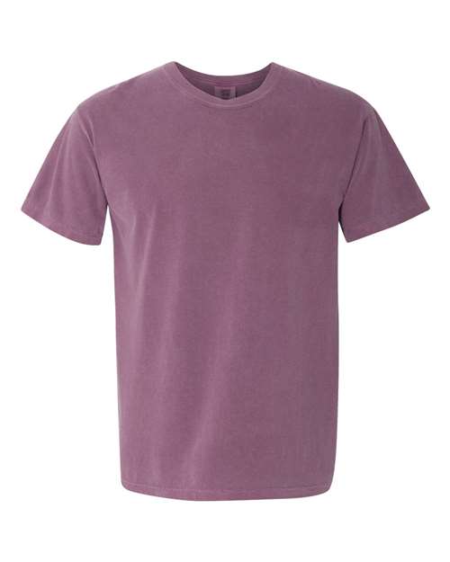 The Comfort Colors 1717 is a short-sleeve, crew-neck t-shirt in dusty purple, crafted from sustainable cotton and garment-dyed for a unique finish, shown on a white background.