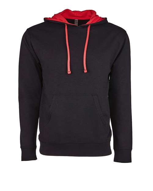 The Next Level 9301 is a black cotton-polyester hoodie in soft French terry fleece, featuring a front pocket, red inner hood lining, and red drawstrings, shown on a plain white background.
