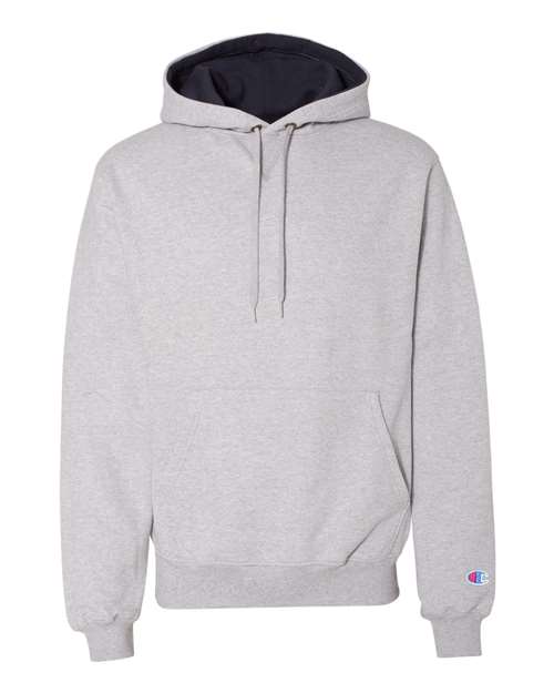 The Champion S171 is a light gray cotton-polyester hoodie with a pouch pocket, drawstrings, and a small embroidered Champion logo on the left sleeve cuff.