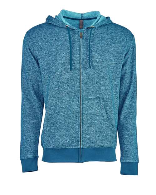 The Next Level 9600 is a blue cotton-polyester hoodie in heather denim fleece, featuring an antique brass YKK zipper, hood with drawstrings, front pockets, and ribbed cuffs and hem, shown on a white background.