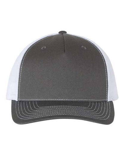 The Richardson 112FP by Richardson is a gray and white trucker hat with a curved bill, visible stitching on the brim, polyester mesh back, and snapback closure. Shown from the front.