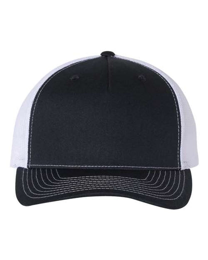 The Richardson 112FP by Richardson is a black and white trucker hat featuring a solid black front, curved black brim with white stitching, breathable polyester mesh back, and an adjustable snapback closure.