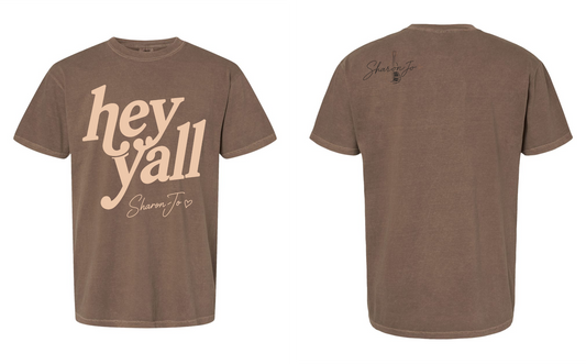 The DB Custom Creations Expresso Hey Yall brown tee features “hey y’all” and “Shamy Jo” with a heart on the front, and a small “Shamy Jo” signature with a heart on the upper back.