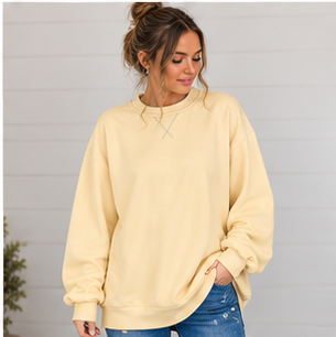 Woman wearing a pale yellow Oversized Mock Neck sweatshirt in a premium fabric for everyday wear.